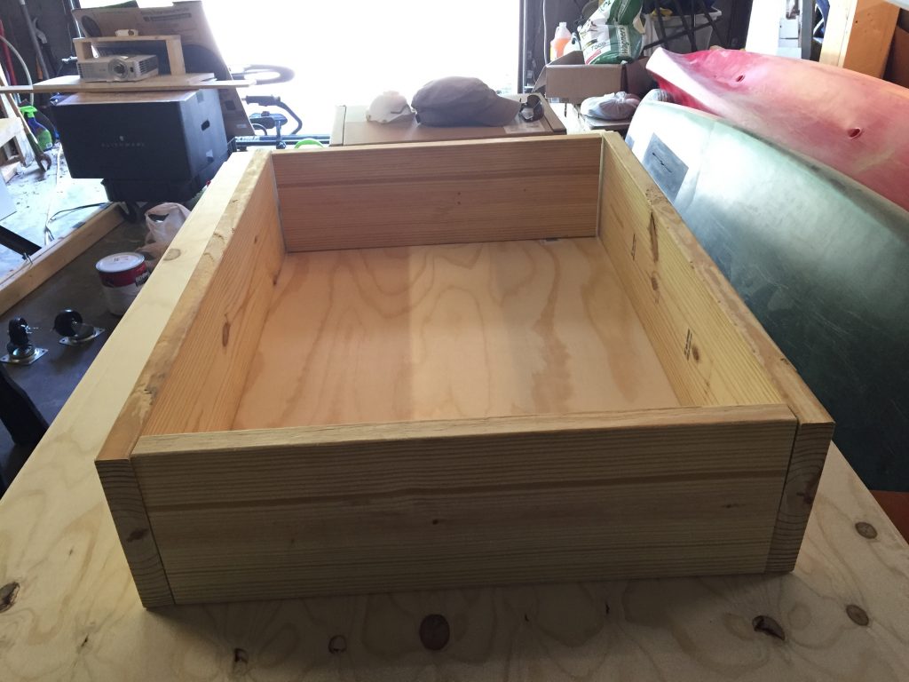 An empty wooden box frame