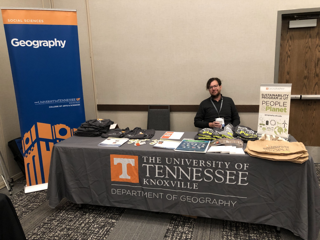 A photo of the Department of Geography booth at the conference