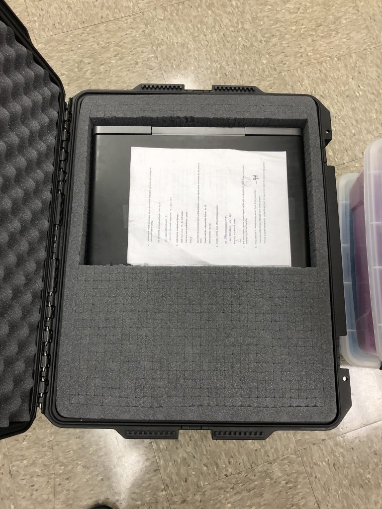 We use a hard sided case to carry the projector, calibration disks, and other electronics